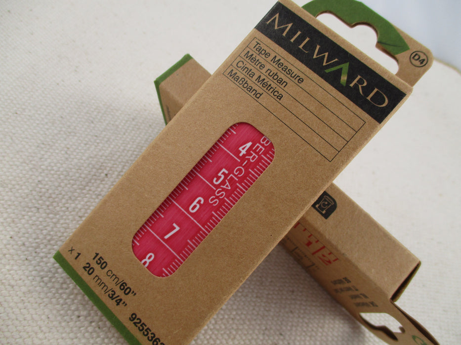 red measuring tape from Milward in cardboard box