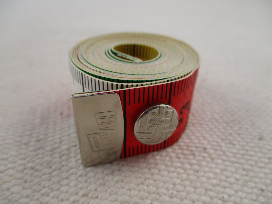 close-up of prym tape measure with button closure