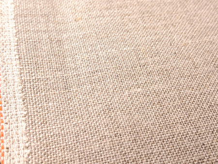 Close-up of beige fabric texture