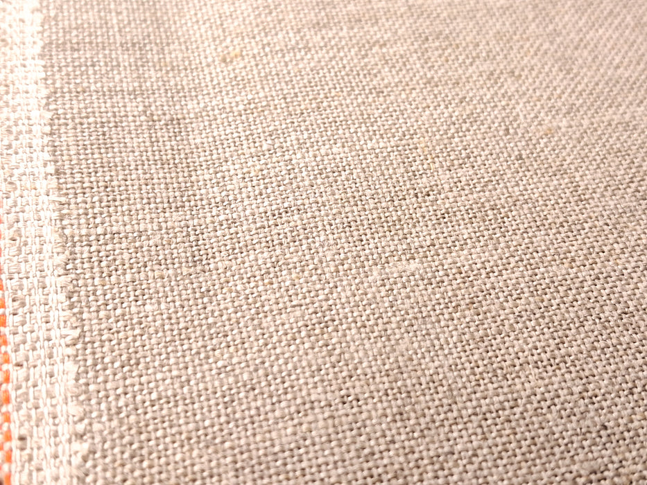 Close-up of beige fabric texture