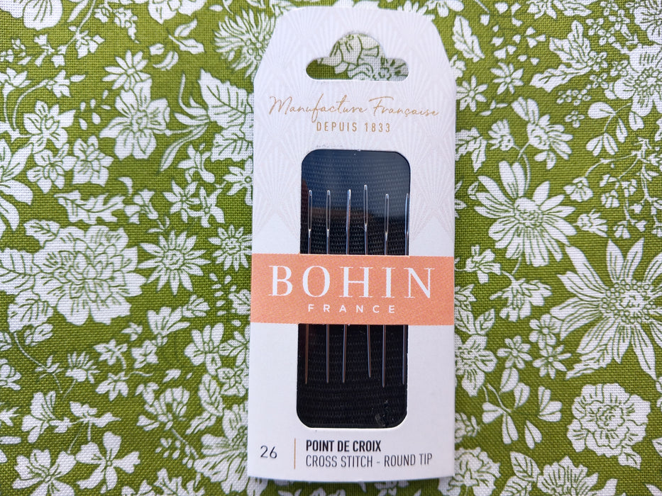 Bohin needle set packaging on a floral fabric background